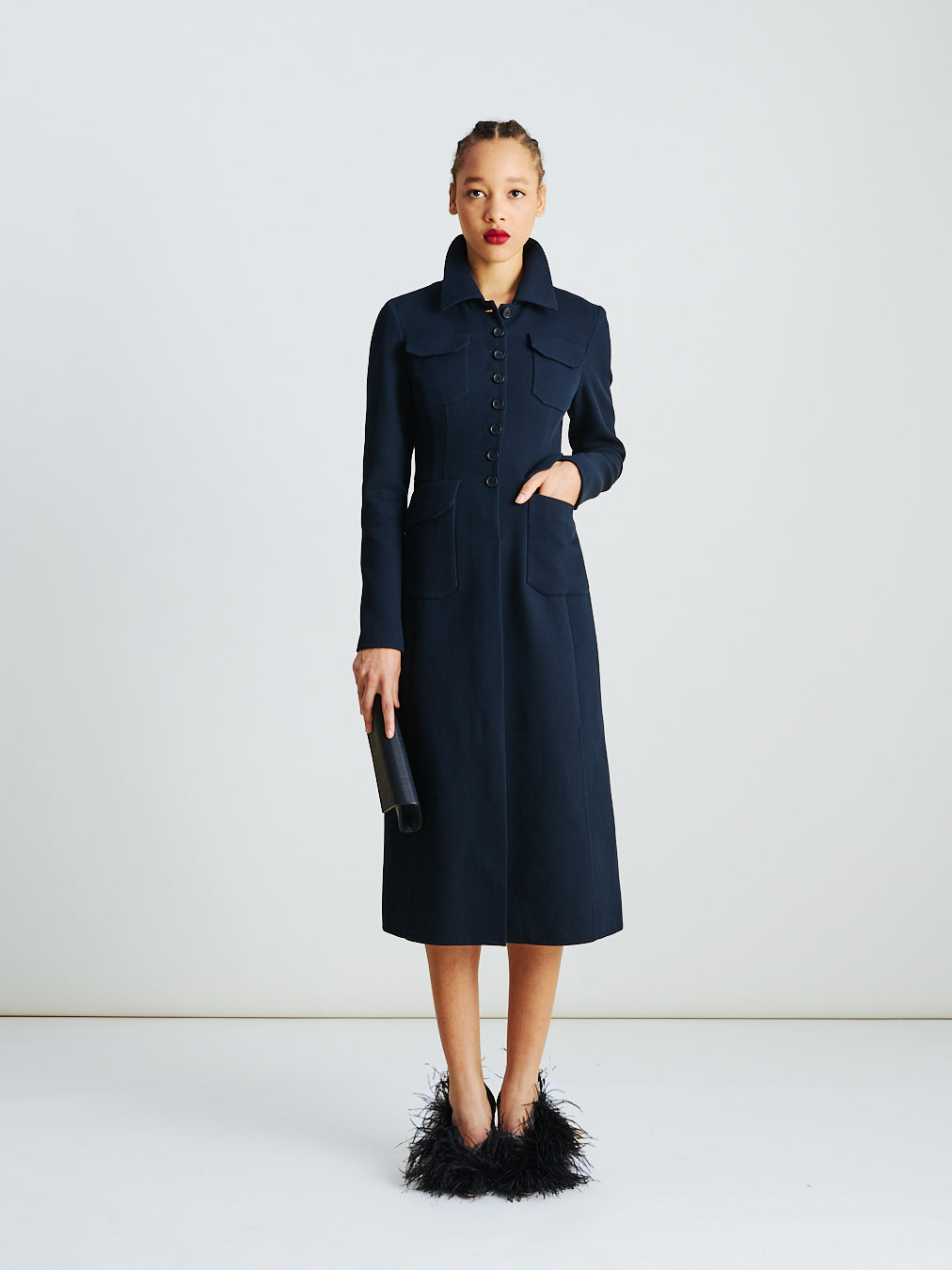 Akris fitted wool double-face midi coat-dress in navy – tailored silhouette with structured collar, long sleeves and refined craftsmanship.