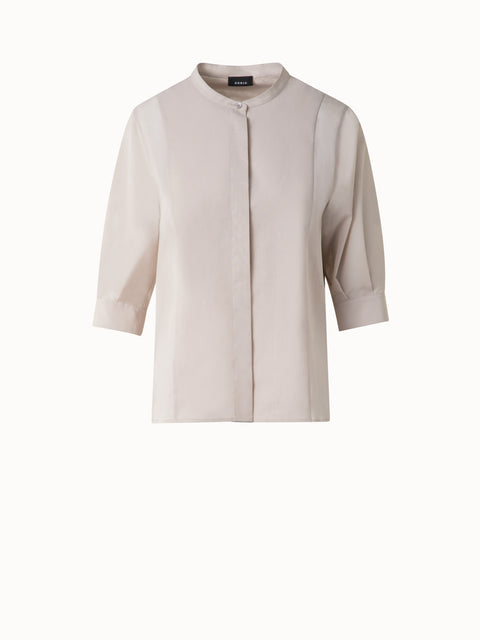 Baumwollbluse mit transparenten Volumenärmeln