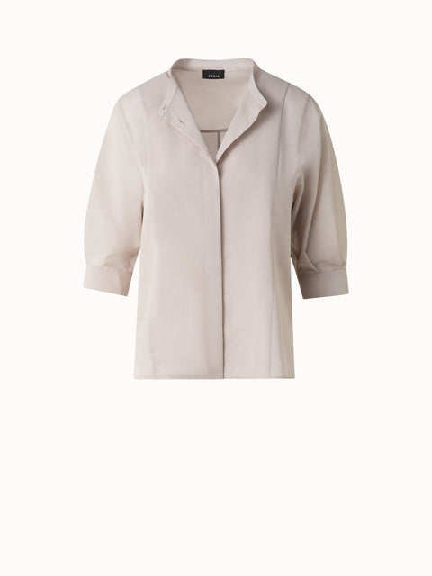 Baumwollbluse mit transparenten Volumenärmeln