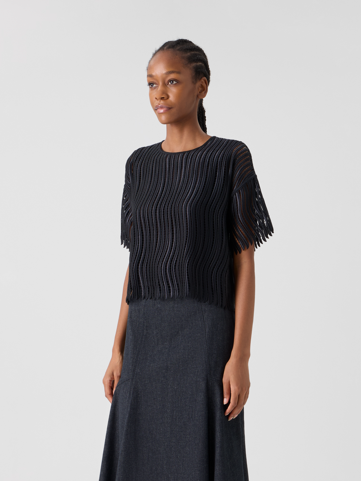 Designer Kastige Bluse aus Wave-Guipure - Schwarz