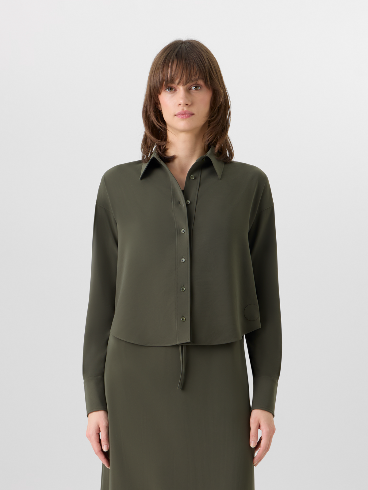 Designer Langärmelige Bluse aus Signature-Lasercut-Krepp - Grün #editorial
